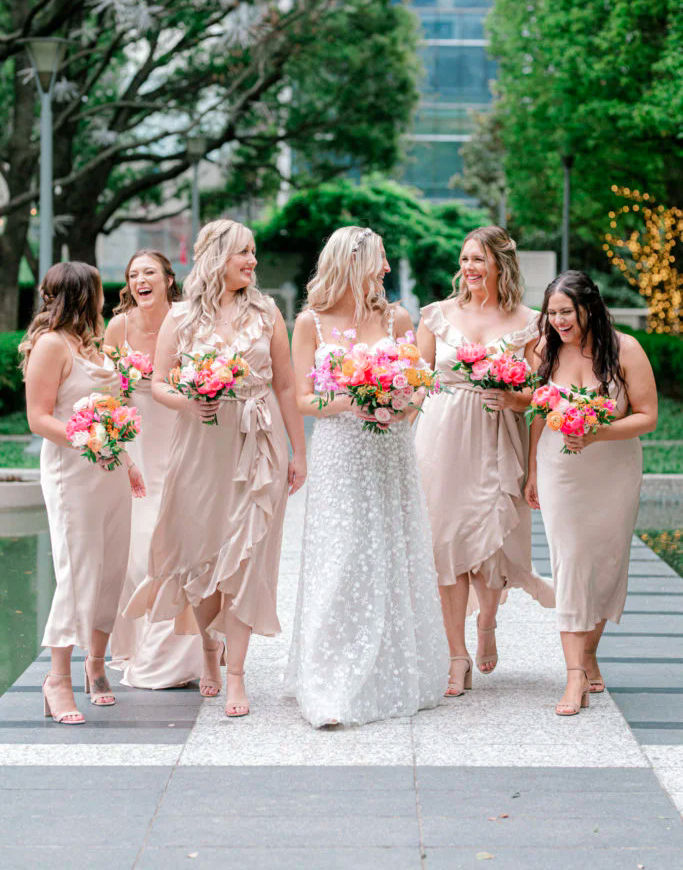 Bride with Bridesmaids Headed to the Wedding