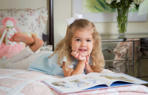 Girl on Bed Reading Story Book - Family Masters #414