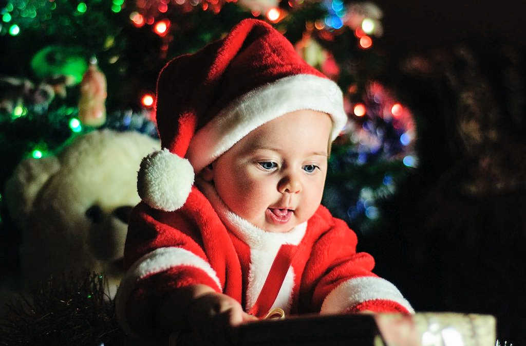 Idaho Family Holiday Portraits: Baby Opening Present