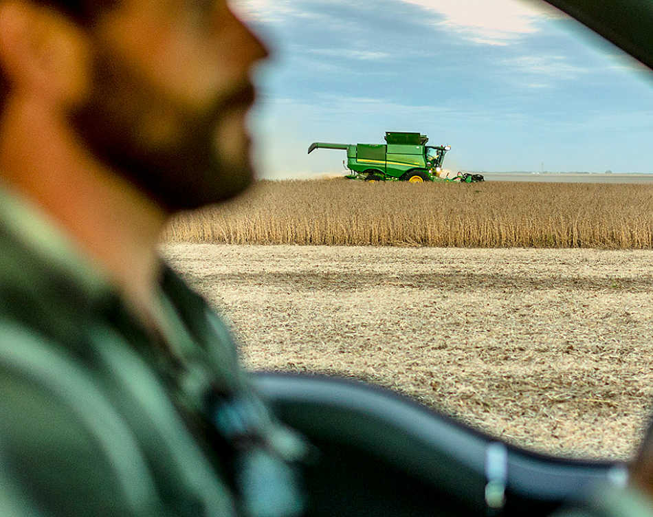 Impact of Branding Photography in Boise - Truck Driver with Wheat Harvester